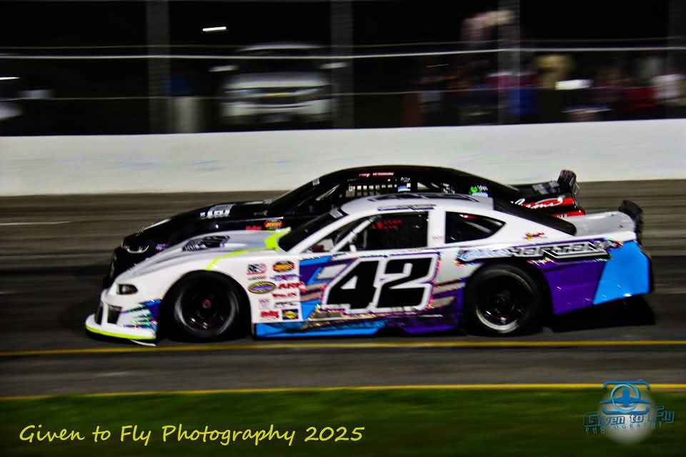 The #42 at speed down the straightaway at night