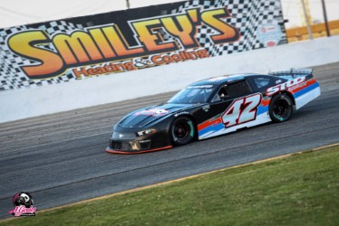 Close racing action with the #42