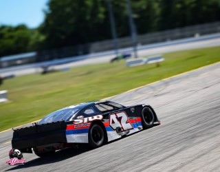 Rear quarter view of the #42 race car