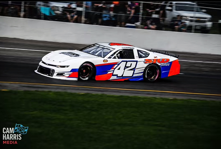 The #42 racing wheel to wheel into a corner